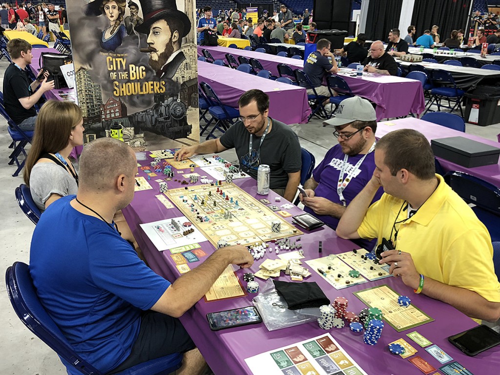 There were lots of indie publishers running demos of their games in Lucas Oil Stadium. Here, Raymond Chandler shows off his upcoming game The City of Big Shoulders. It's a sprawling 2.5+ hour worker placement, stock manipulation game that's guaranteed to quell the hunger of 18XX and heavy game players looking for a new experience!