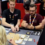 Clay Ross, founder of Capstone Games, running a demo of their Gen Con release, Watergate. It was my #1 most-anticipated game of the con.